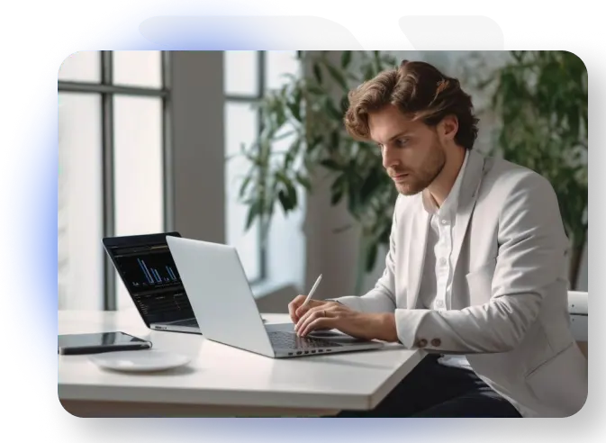 Man on laptop, working diligently
